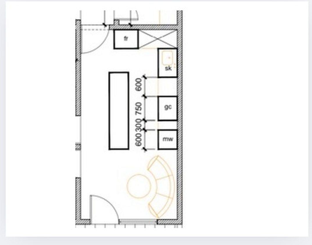 Technical floor plan of the kitchen showing equipment zoning and clearances